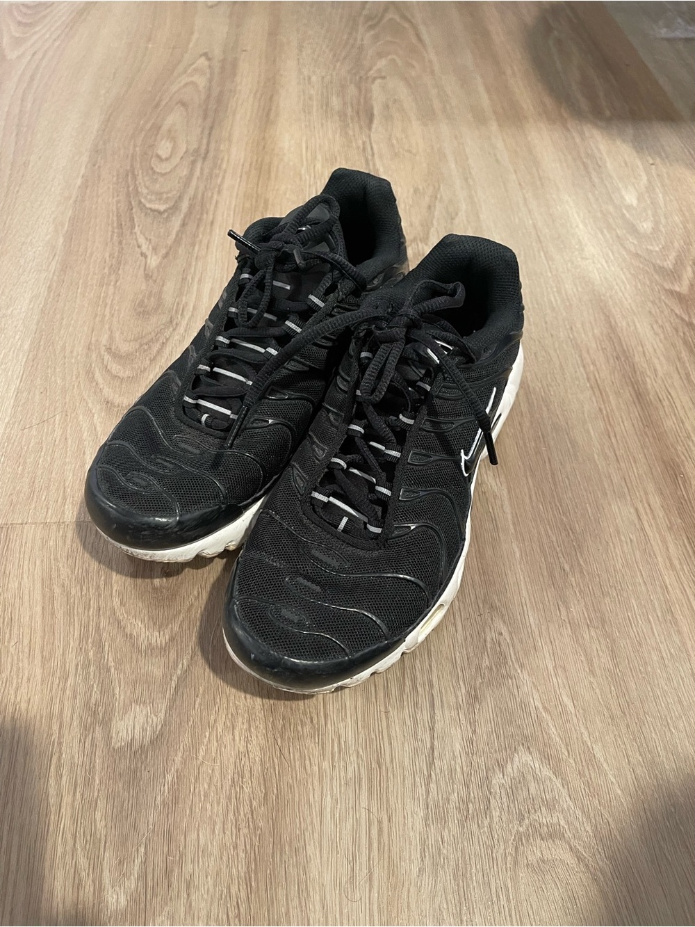 Nike Black Sneakers with White Sole Accent